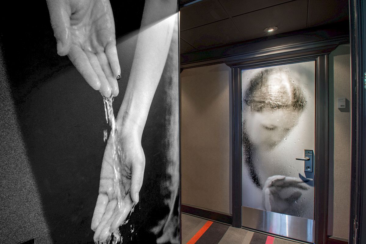 The image shows a split scene: hands catching water, and a person editing a phone through a frosted glass door, always ending the sentence.