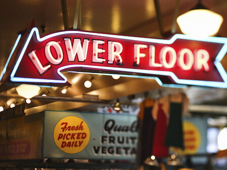 The image shows a neon sign reading